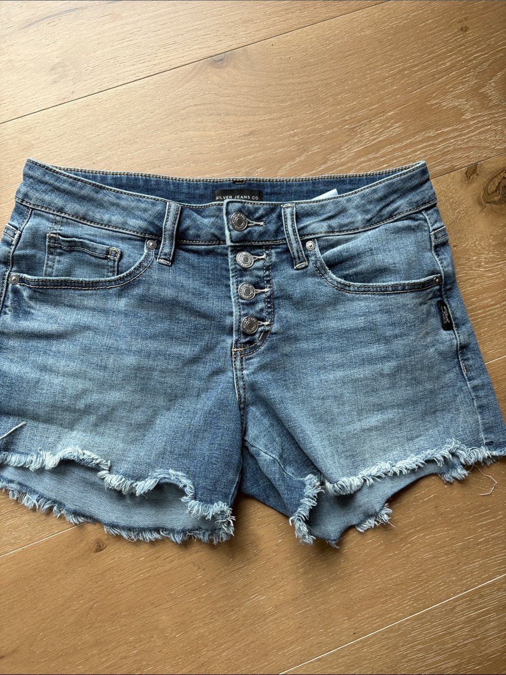 Silver Jeans Medium Blue Distressed Frayed Hem Denim Shorts